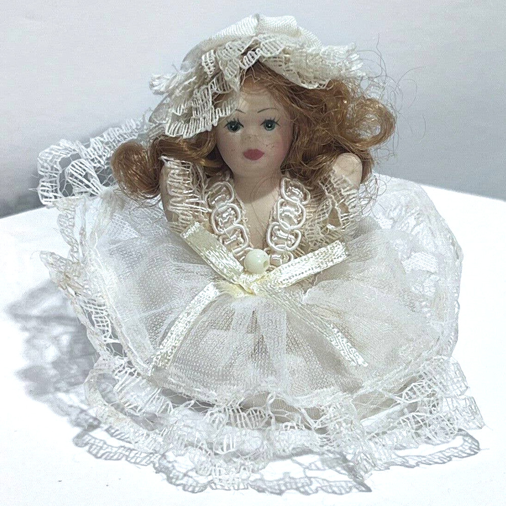 Vintage Ceramic Bisque Miniature Sitting Victorian Dressed Doll 2.5"